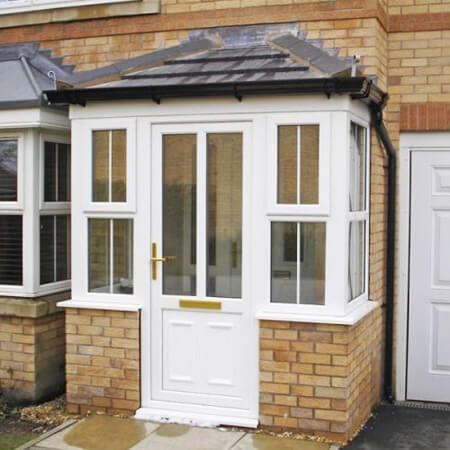 SW Plastic porch. Simple but sleek porch fitted against a front door to a home.